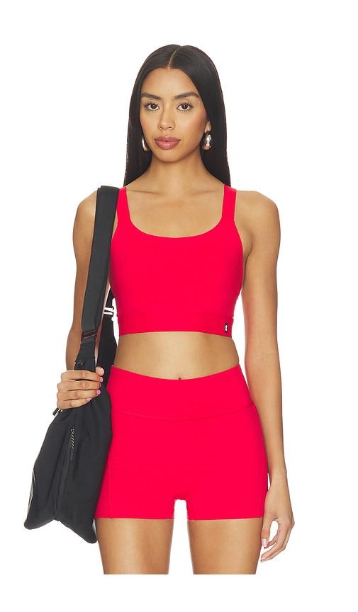 on performance bra in red.