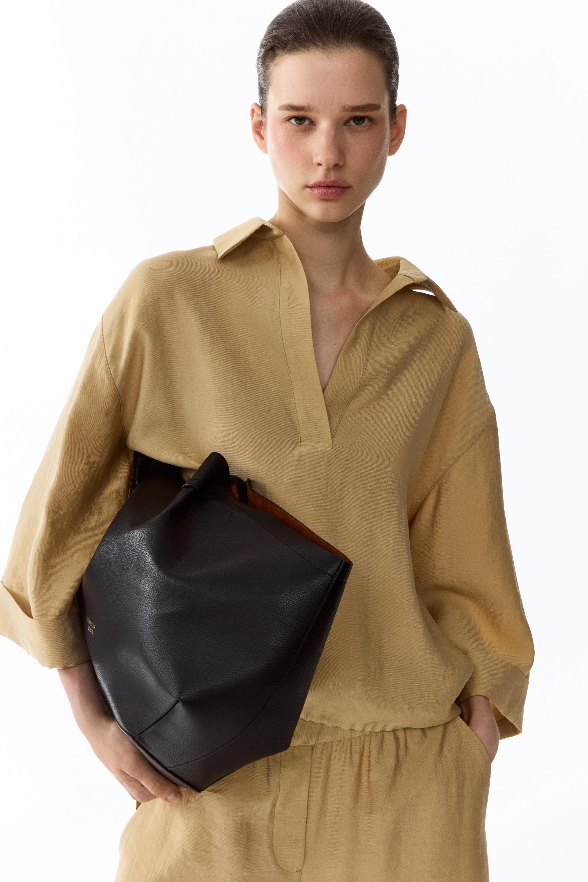 oversized lyocell-blend blouse