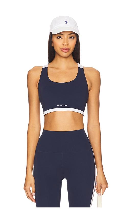 p.e nation highgate sports bra in navy.