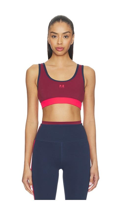 p.e nation pursuit sports bra in burgundy.