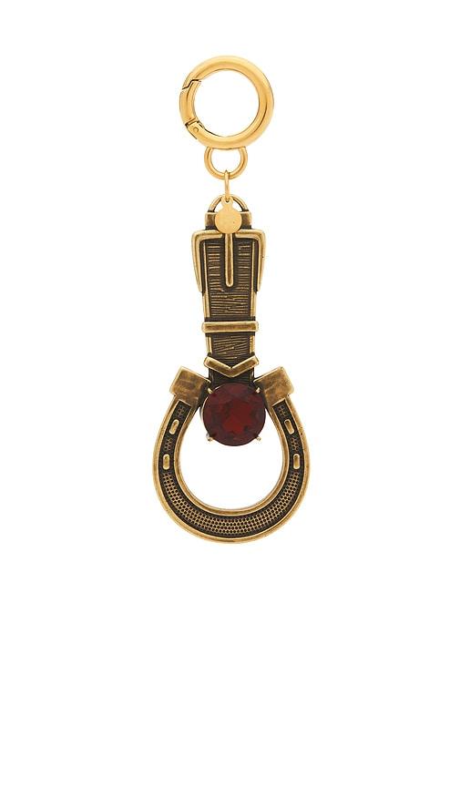 petit moments horseshoe keychain in metallic gold.