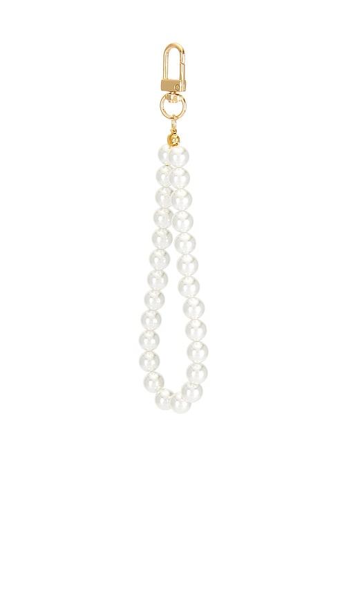 petit moments pearl key chain in white.