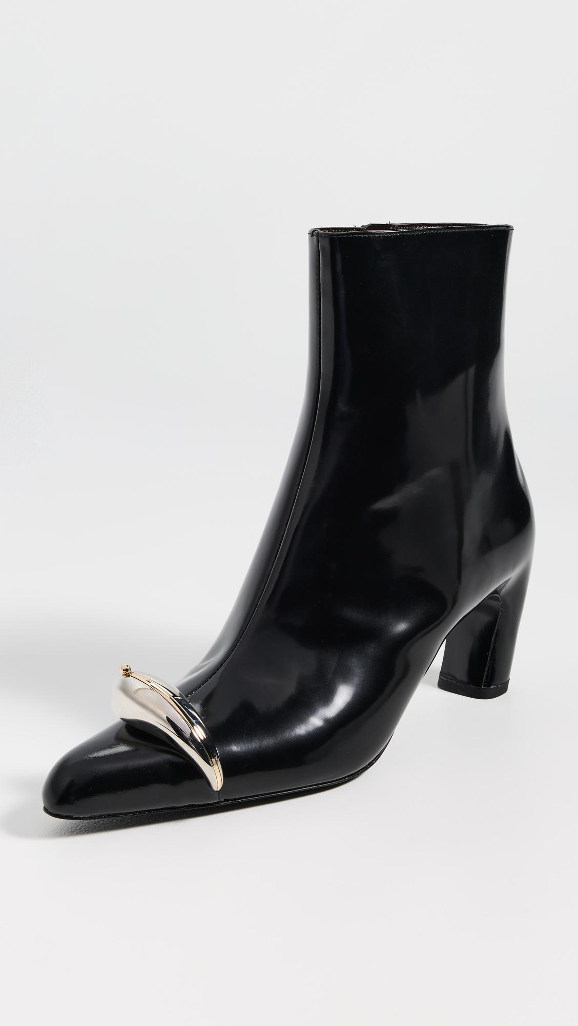 pierced heeled ankle boots