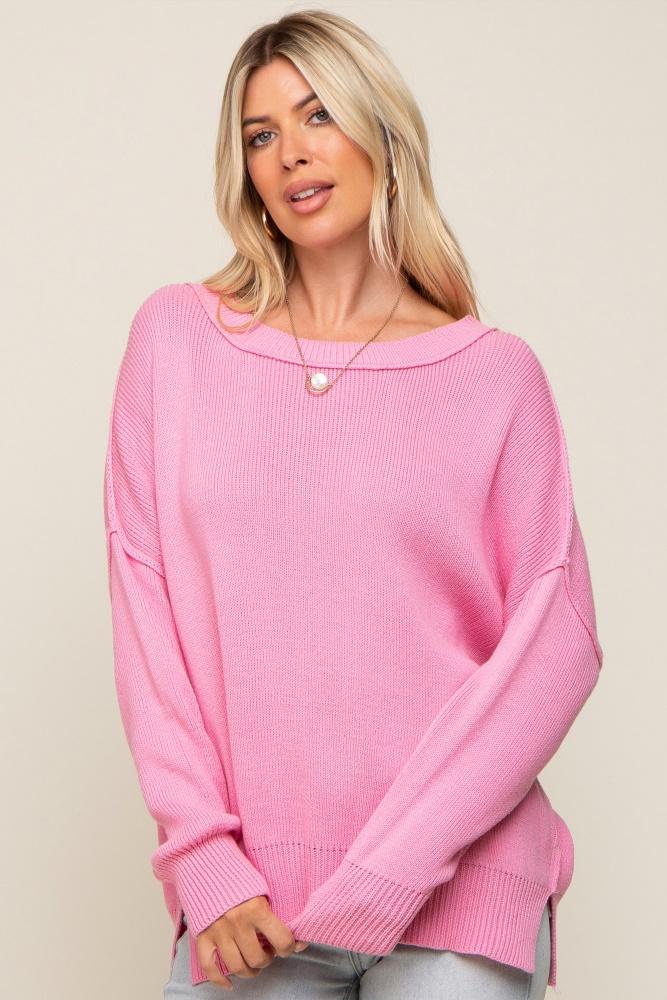 pink exposed seam side slit sweater