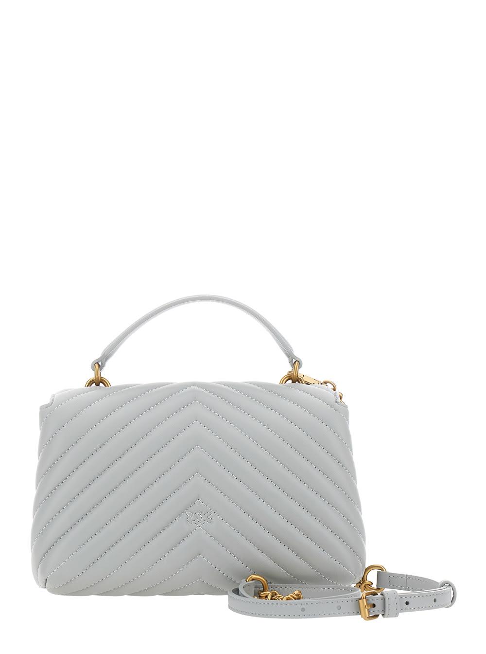 pinko shoulder bag with adjustable and removable strap and love birds plaque on the front in gray leather for women