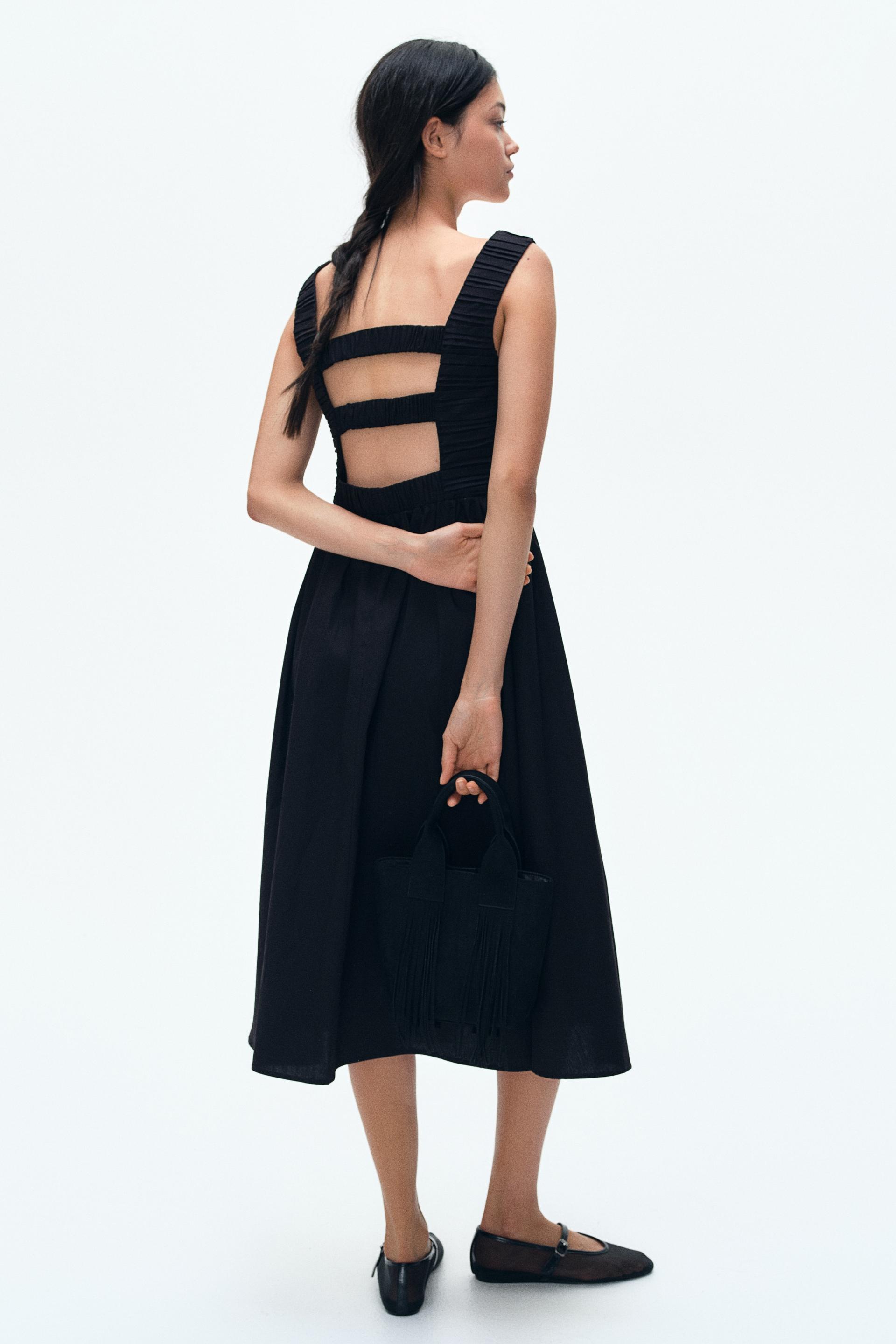 pintuck-detail dress with flared skirt