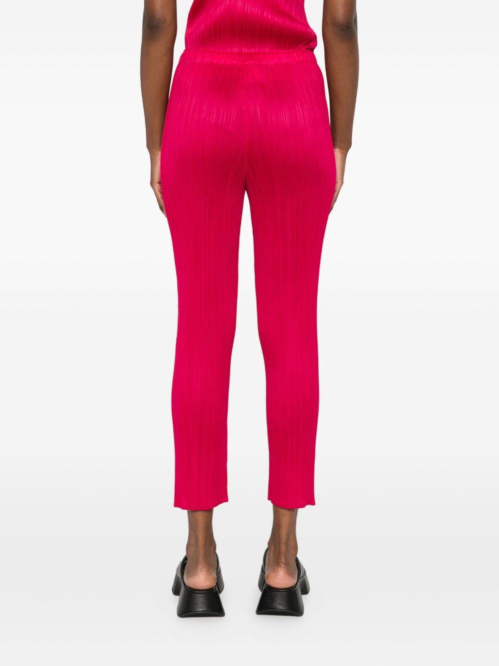 pleats please trousers red polyester - women