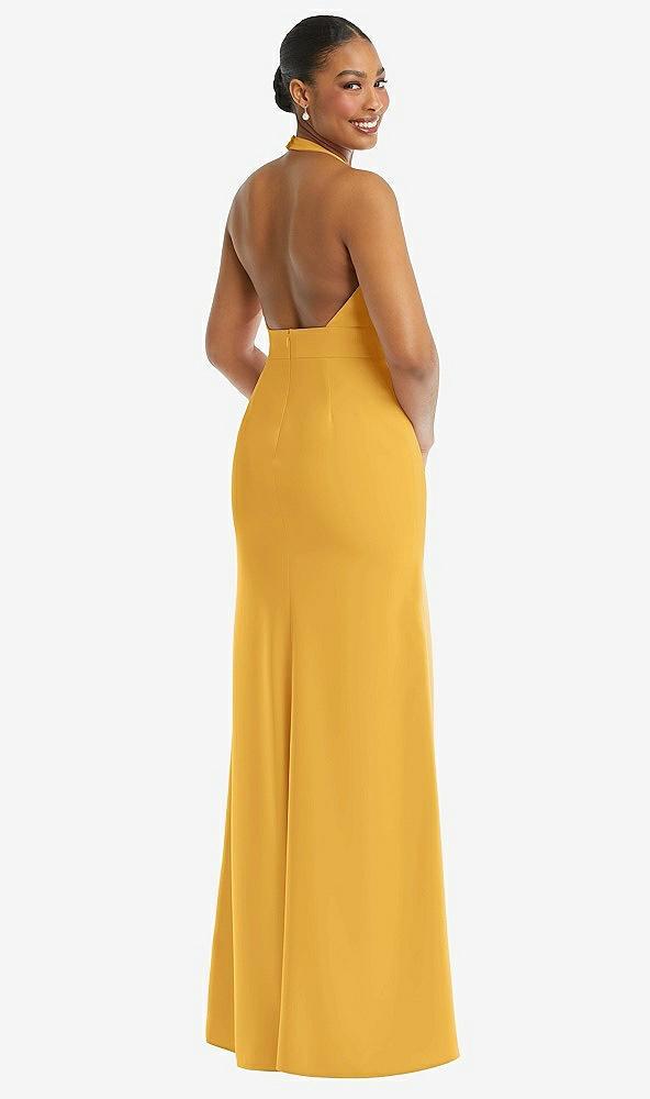 plunge neck halter backless trumpet gown with front slit