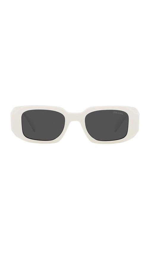 prada scultoreo narrow sunglasses in white.