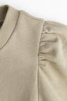 puff-sleeved top