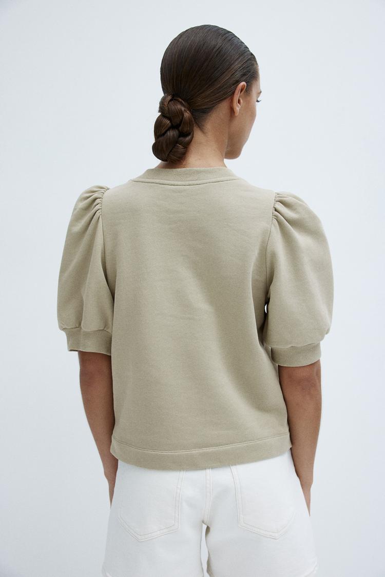 puff-sleeved top