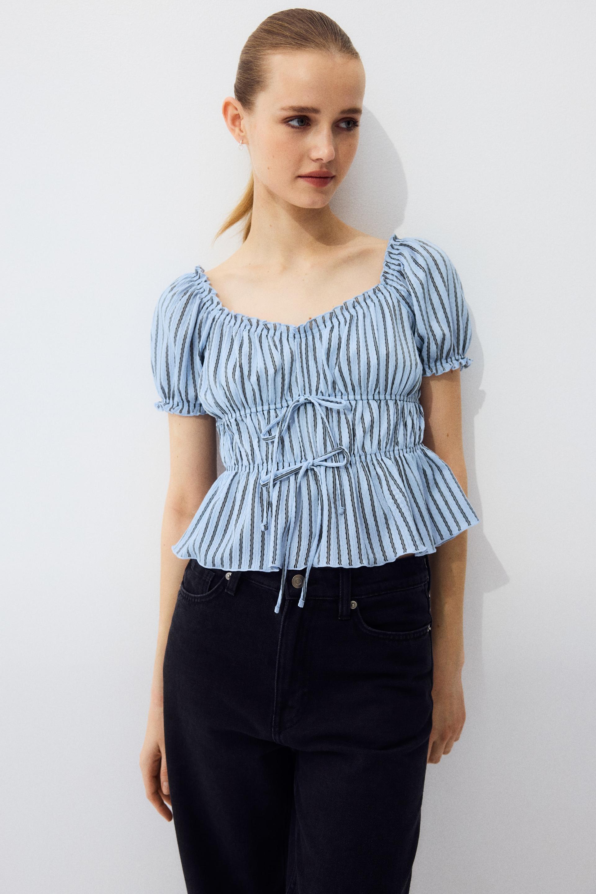 puff-sleeved top