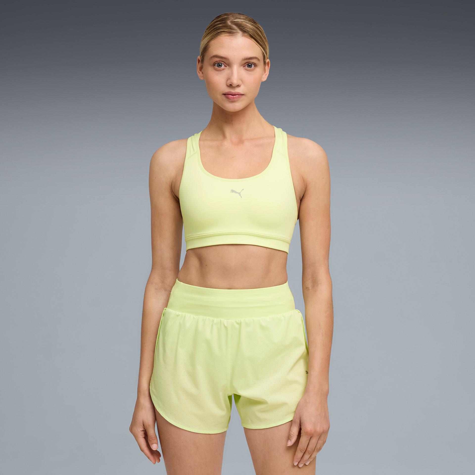 puma 4keeps run women's moisture wicking, mid impact sports bra in green, size m