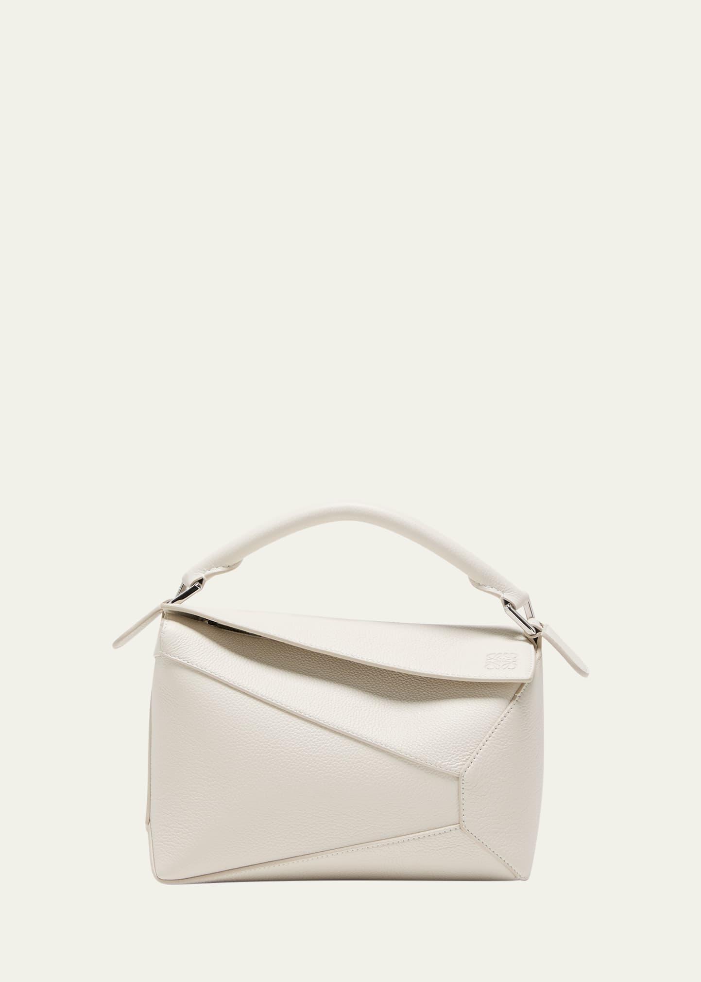 puzzle edge small top-handle bag in soft grained leather