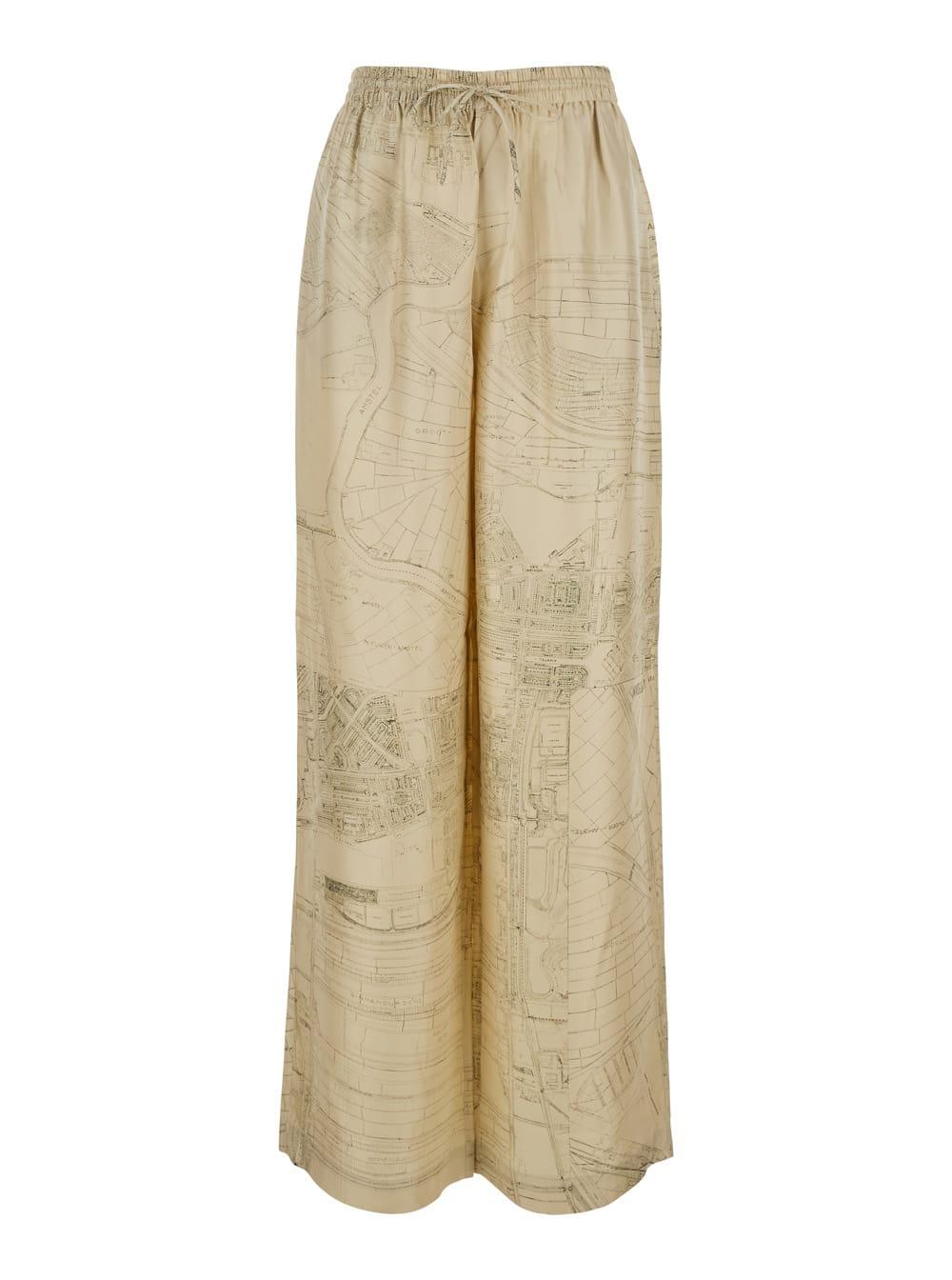 róhe beige silk pants with elastic waist and drawstring and all-over print for women