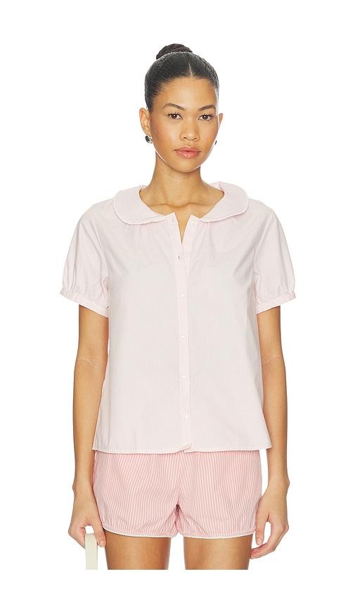 rat boi puff sleeve button down in pink.