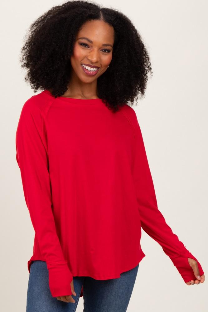 red exposed seam long sleeve top