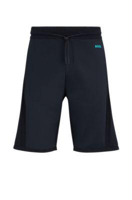 regular-fit shorts with contrasting logo print- dark blue men's shorts