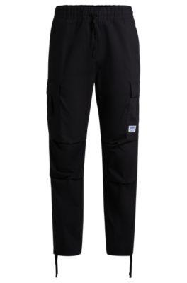 relaxed-fit cargo trousers in structured cotton- black men's casual pants