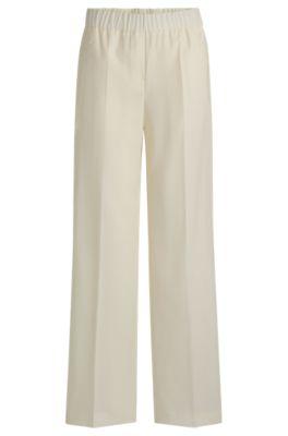 relaxed-fit trousers in wool- white women's formal pants