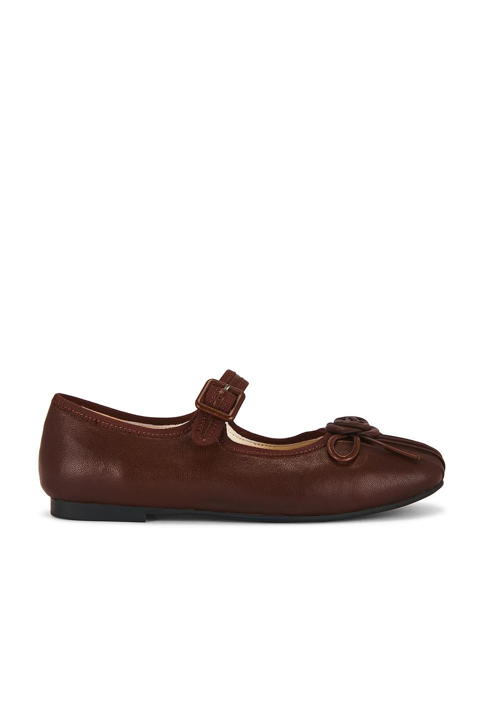 rosette sheepskin mary janes