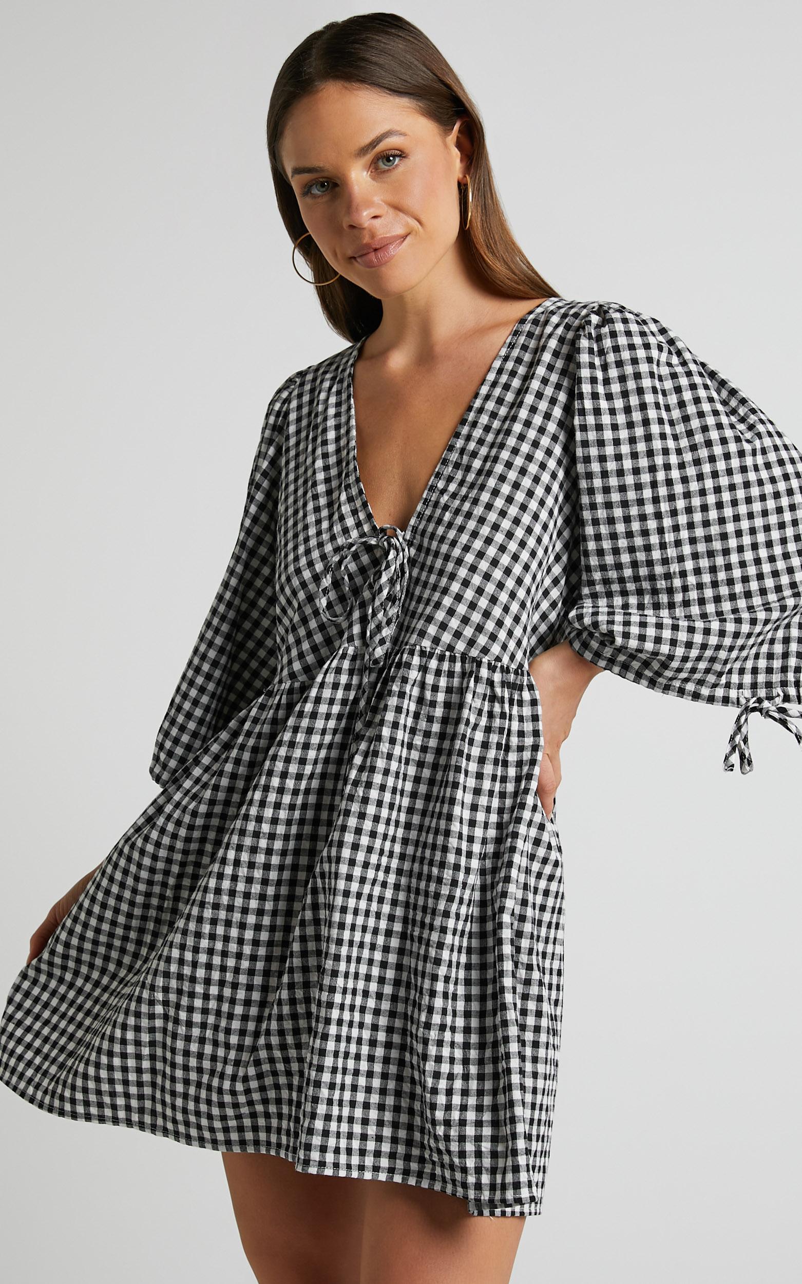 rosita mini dress - tie front puff sleeve dress in black and white check