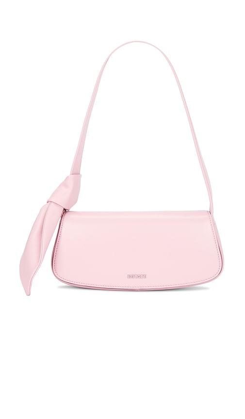 rotate leather knot strap bag in pink.