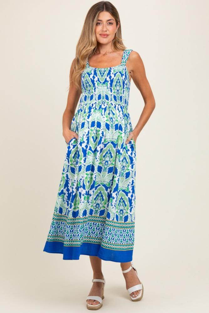 royal blue floral sleeveless smocked maternity midi dress