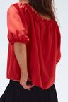 ruffle-trimmed blouse