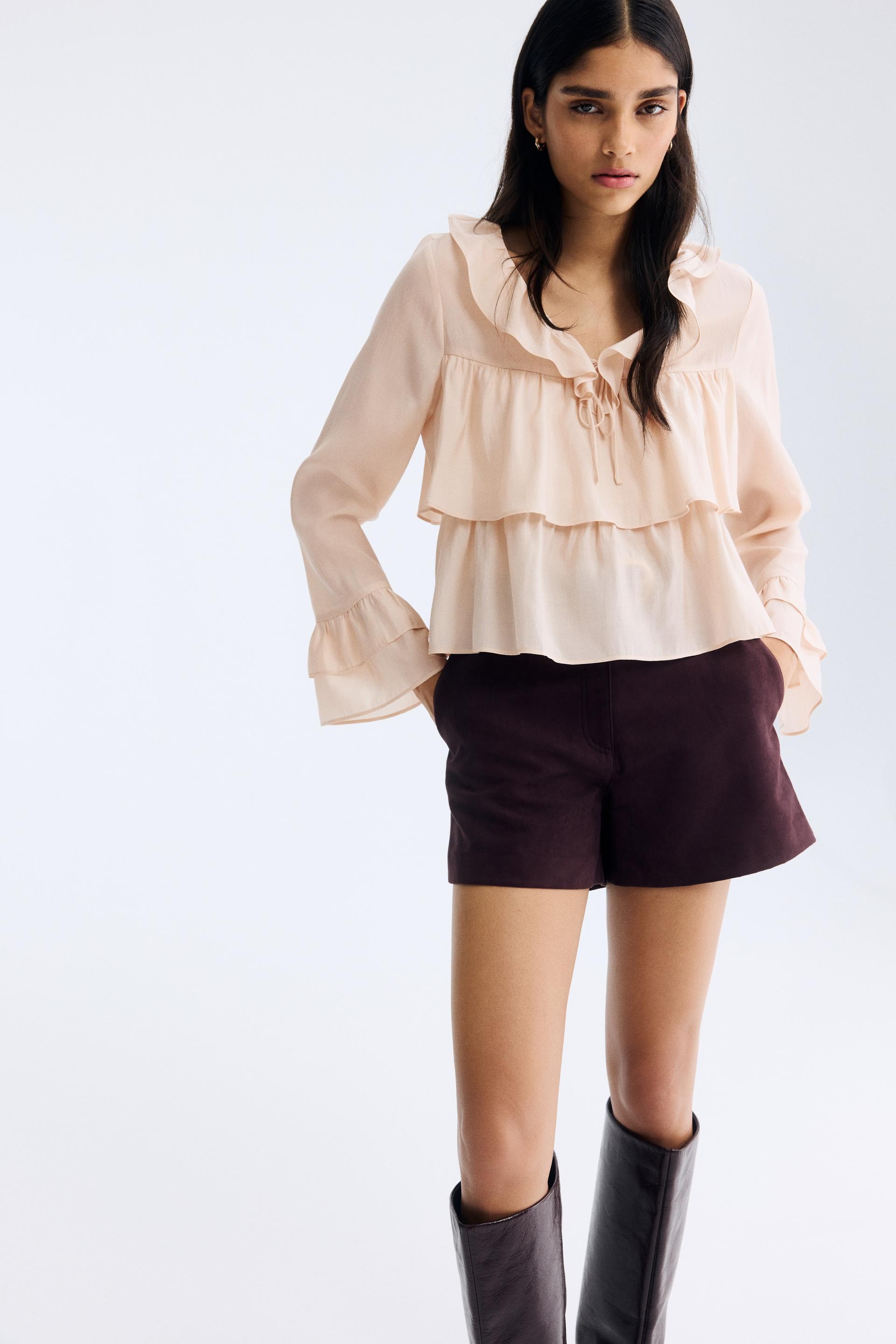 ruffle-trimmed blouse
