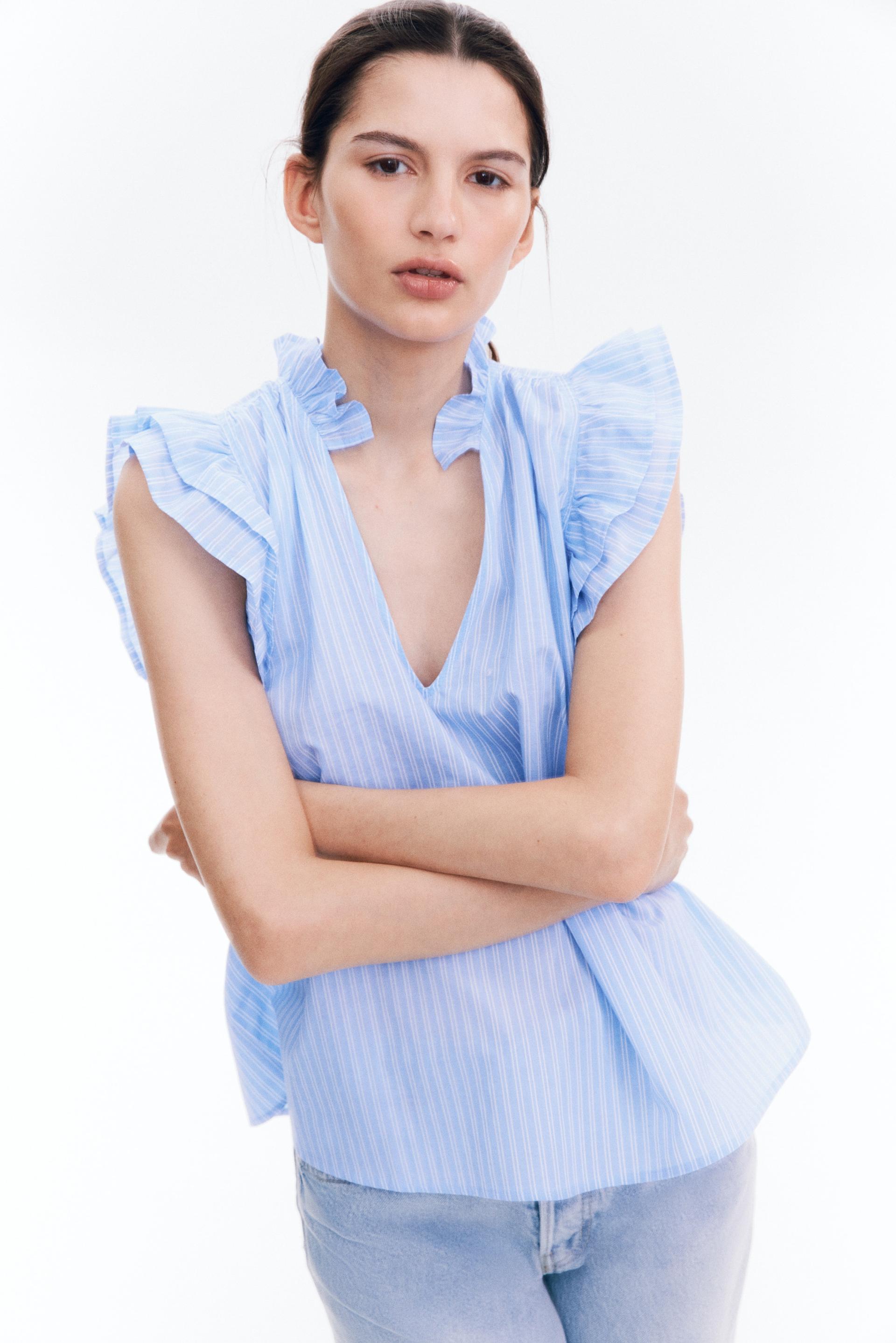 ruffle-trimmed blouse