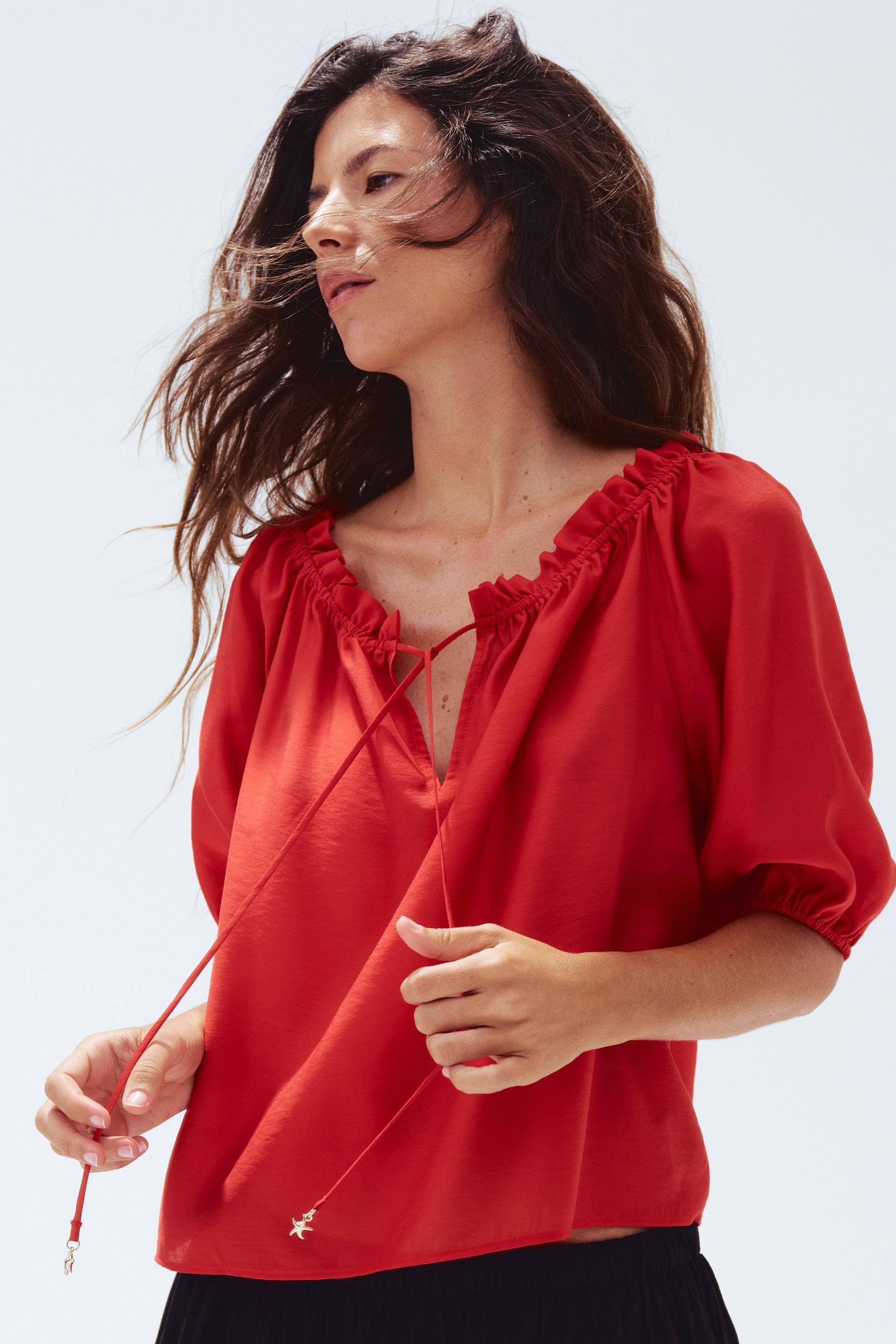 ruffle-trimmed blouse