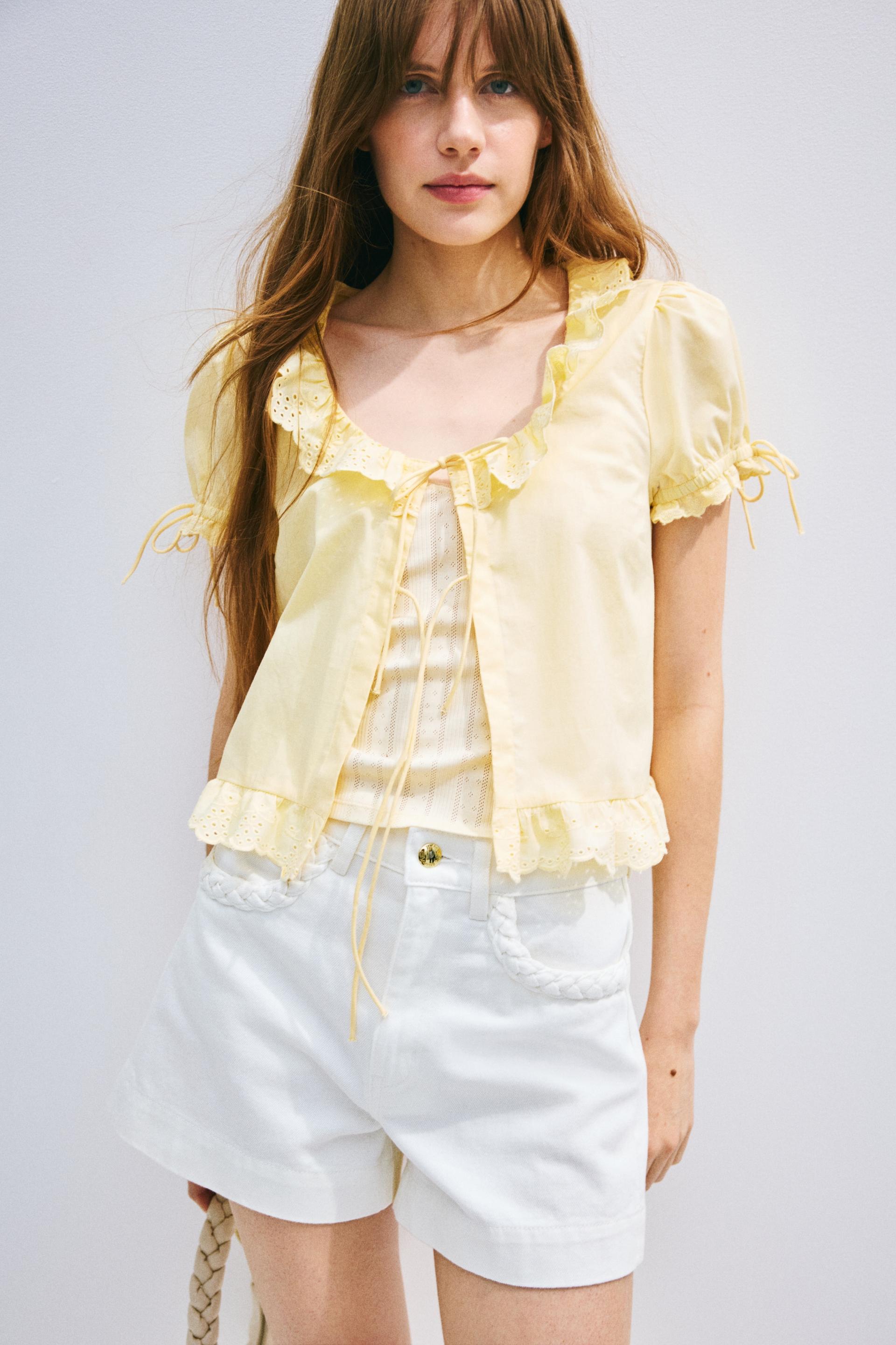 ruffle-trimmed cotton blouse
