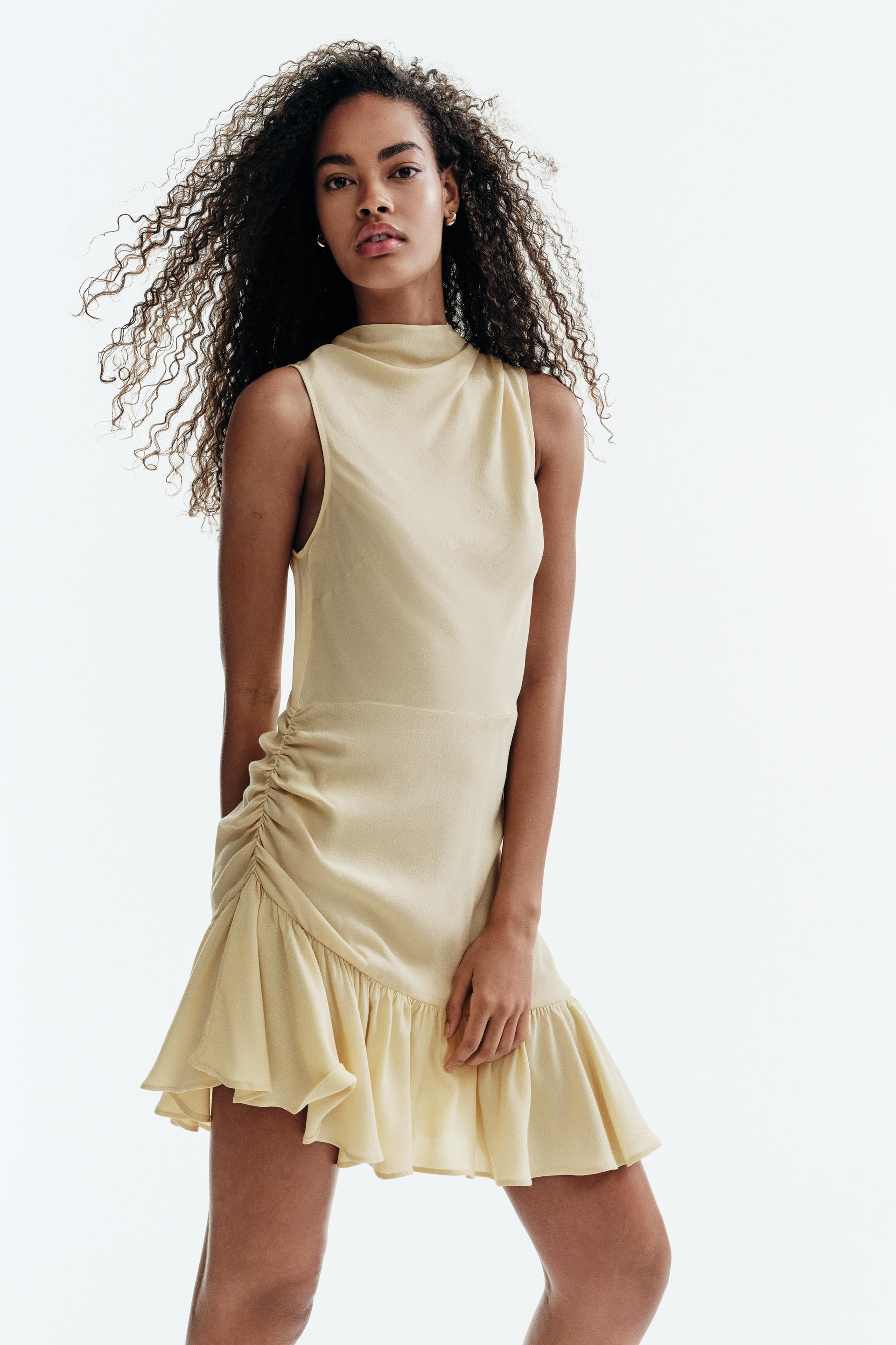 ruffle-trimmed crêpe dress