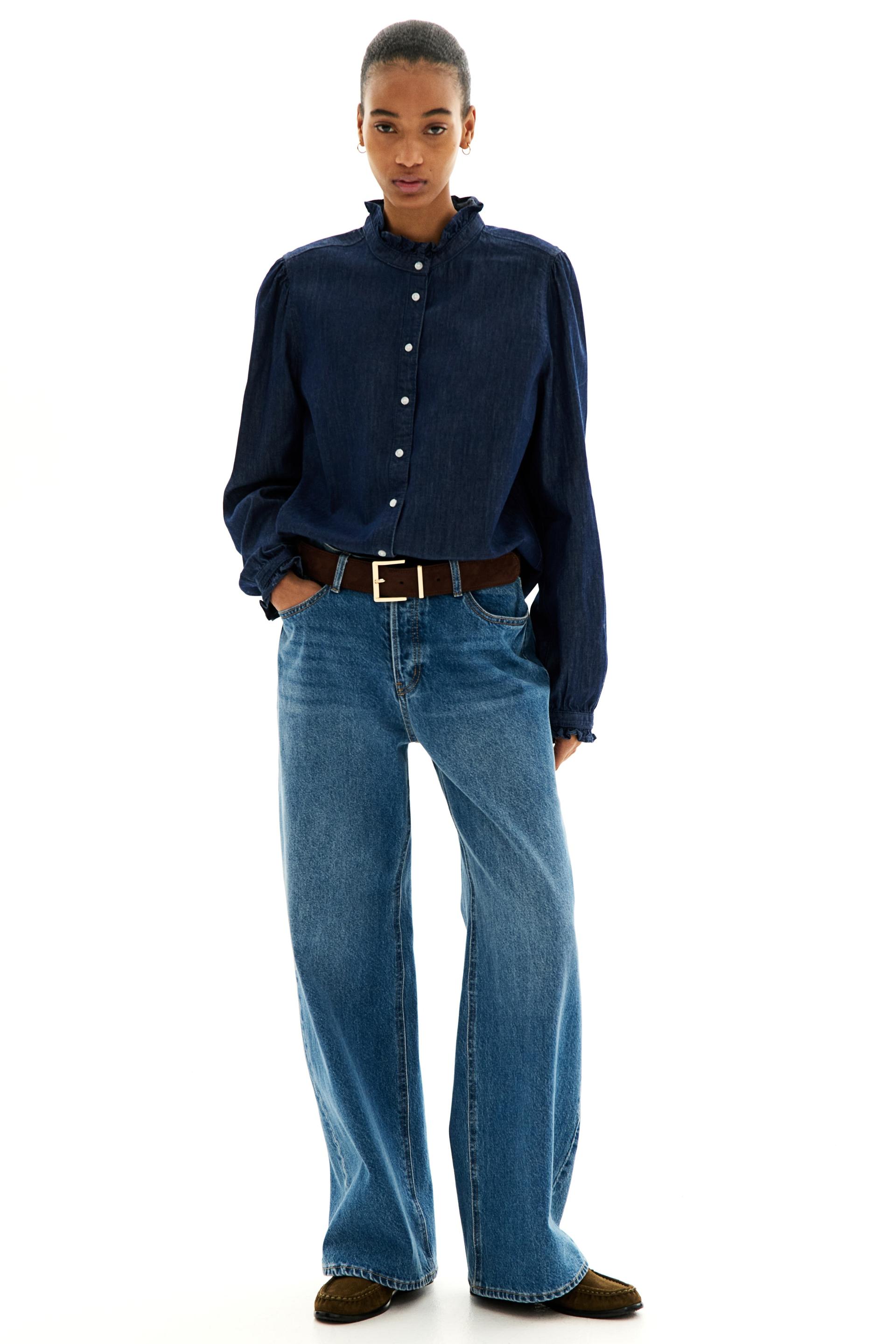 ruffle-trimmed denim blouse