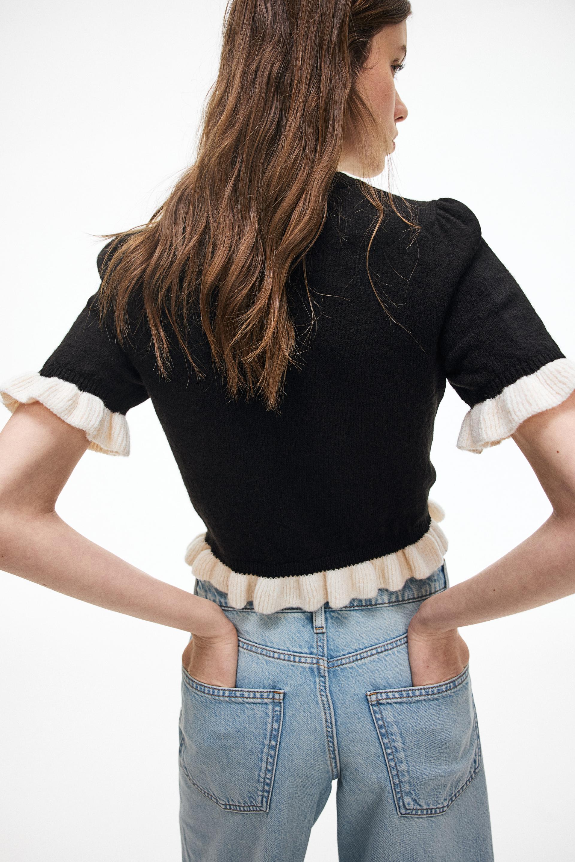 ruffle-trimmed knit top