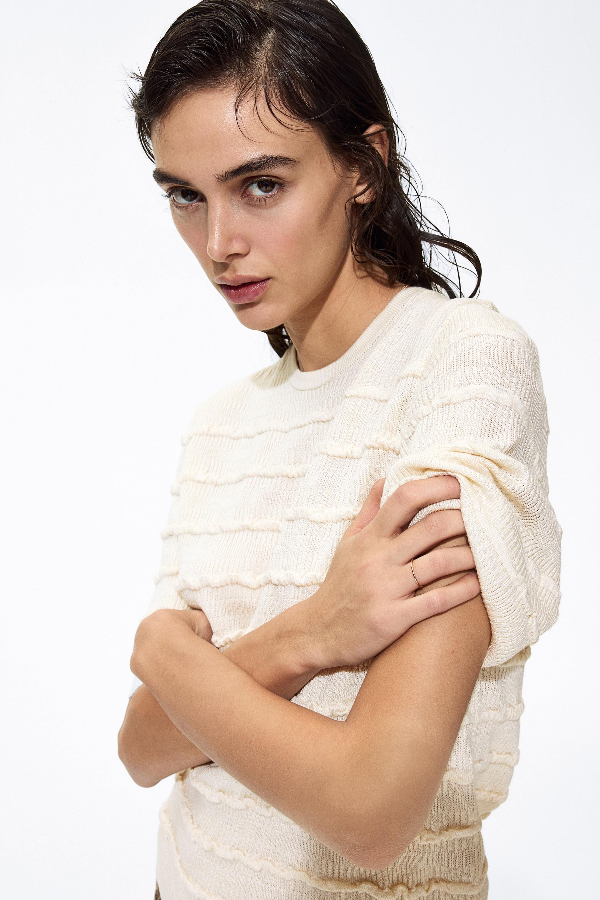 ruffle-trimmed knit top