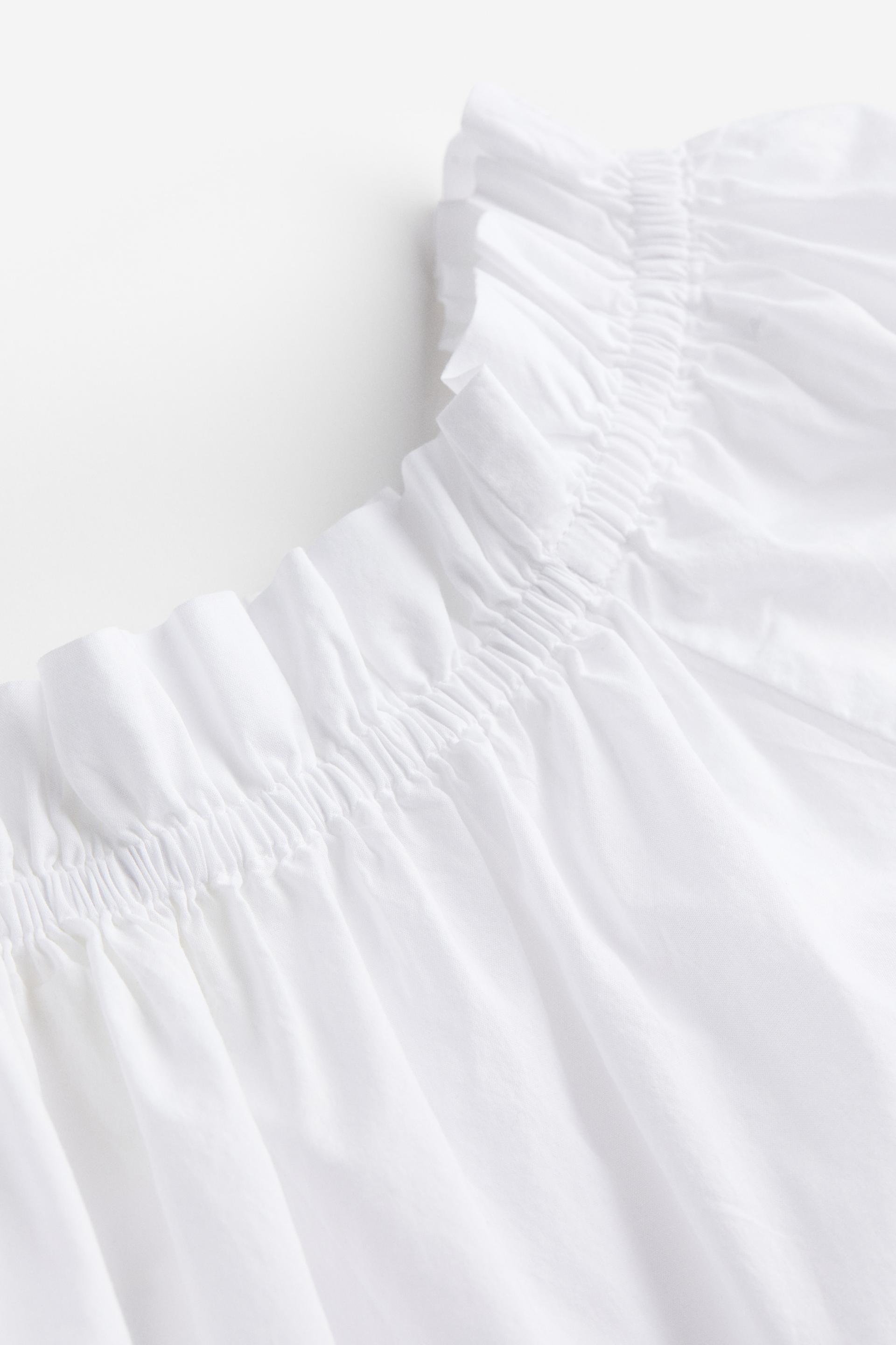 ruffle-trimmed off-the-shoulder top