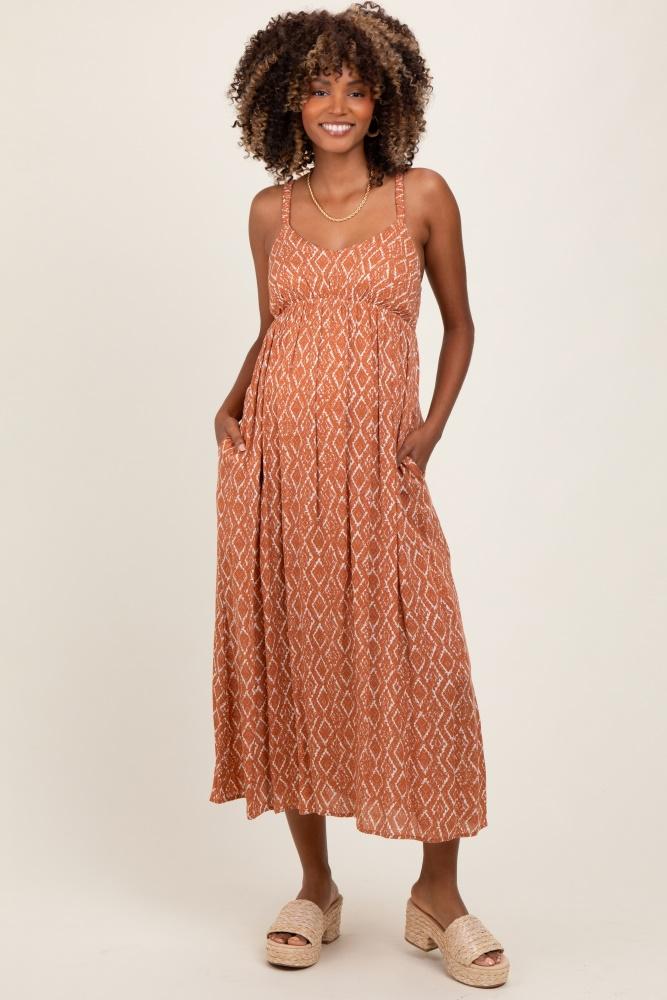 rust printed sleeveless maternity midi dress