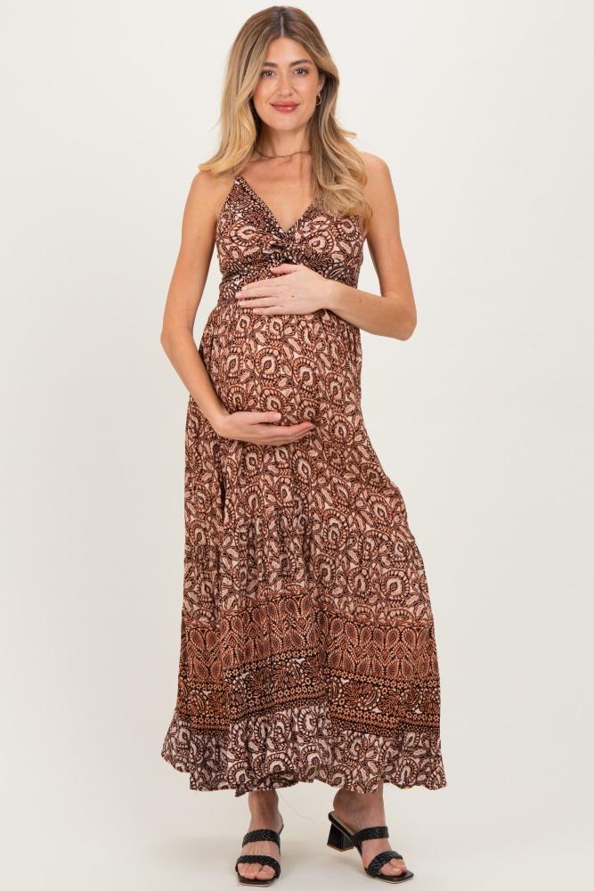 rust printed twisted front maternity maxi dress