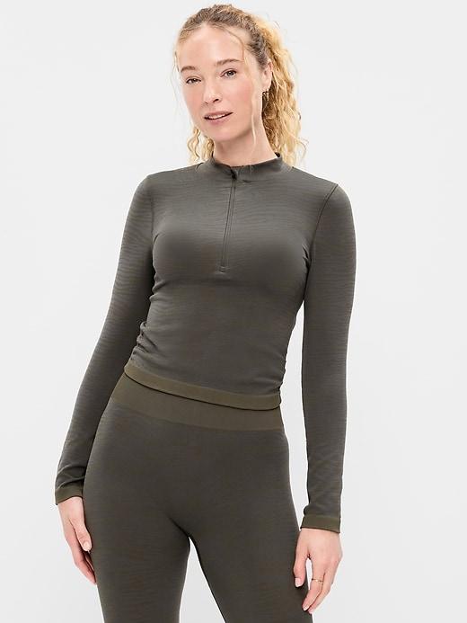 seamless jacquard mock-neck half-zip top
