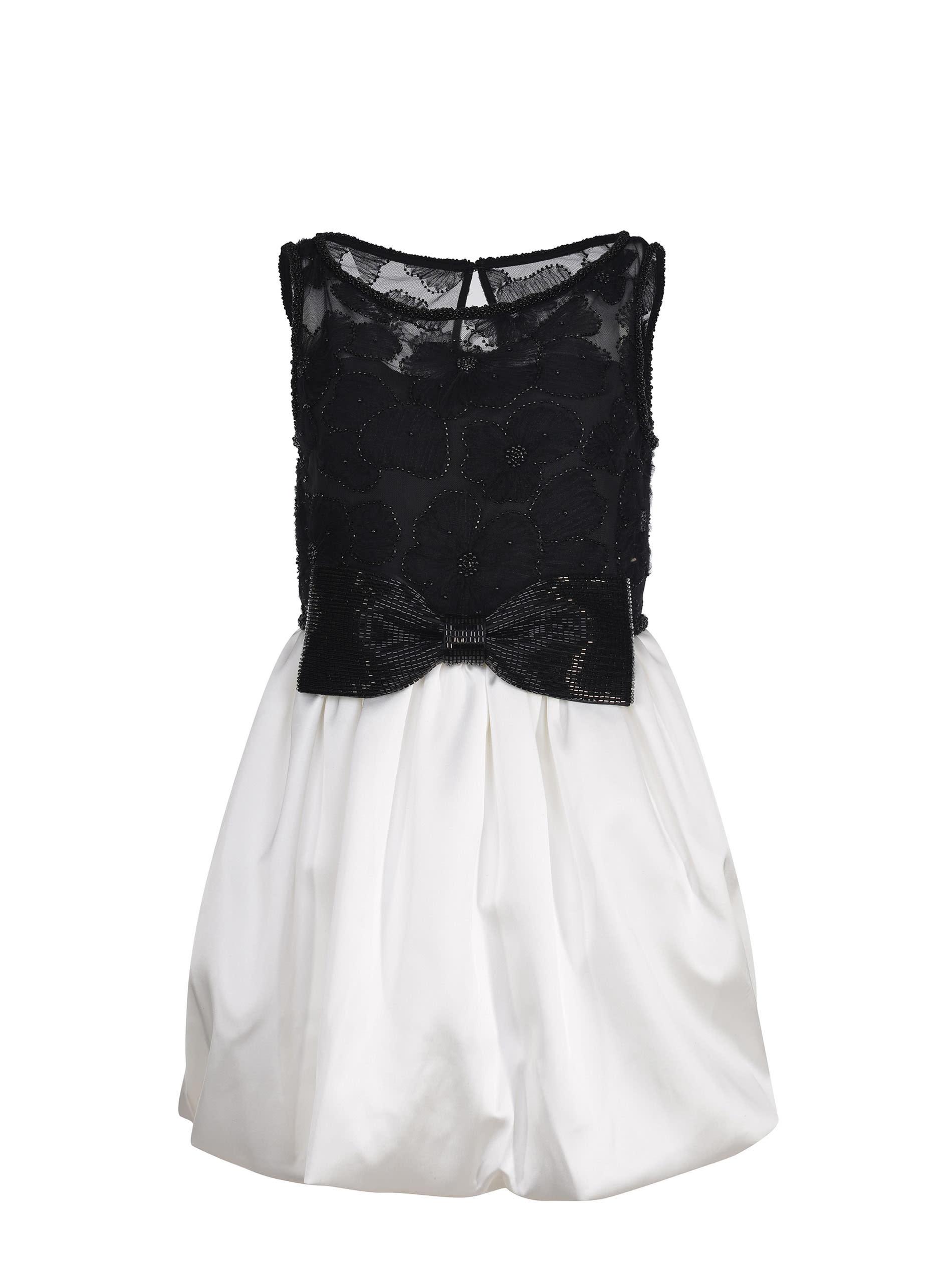 self-portrait dress made of polyester.