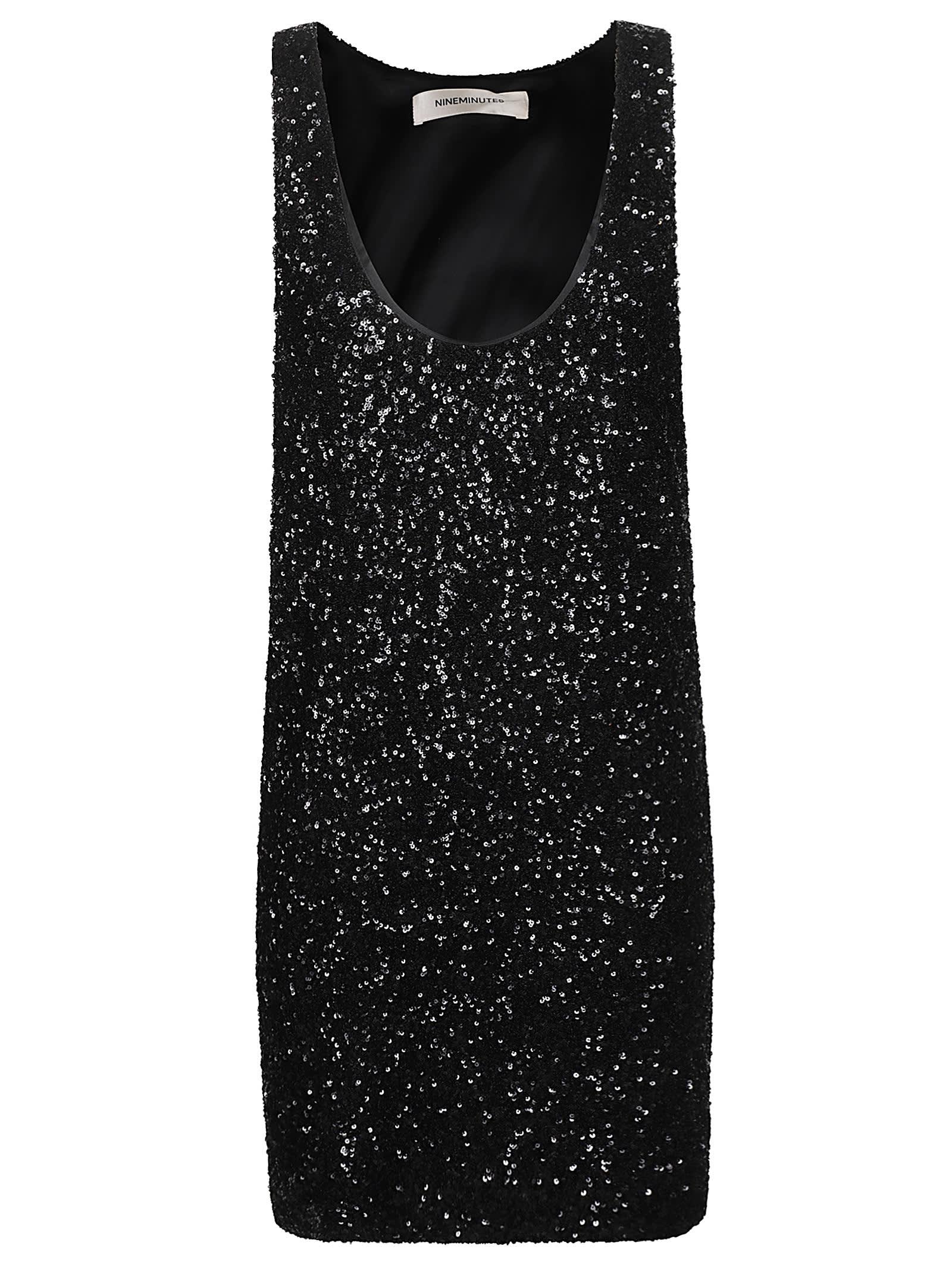 sequin-coated sleeveless dress