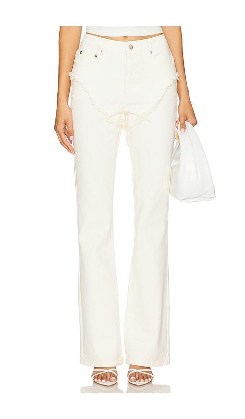seroya dahlia frayed bootcut jeans in cream.