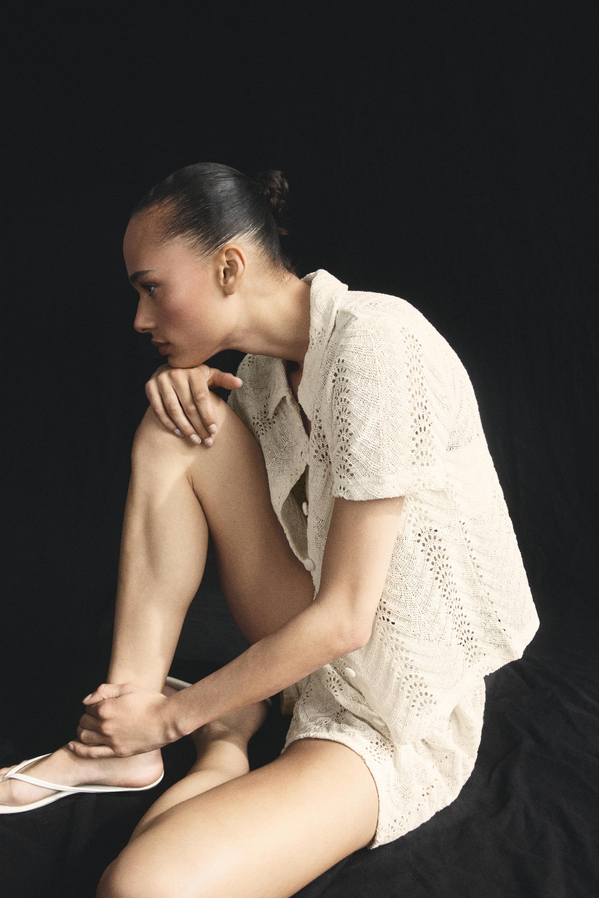 short-sleeved crochet-look shirt