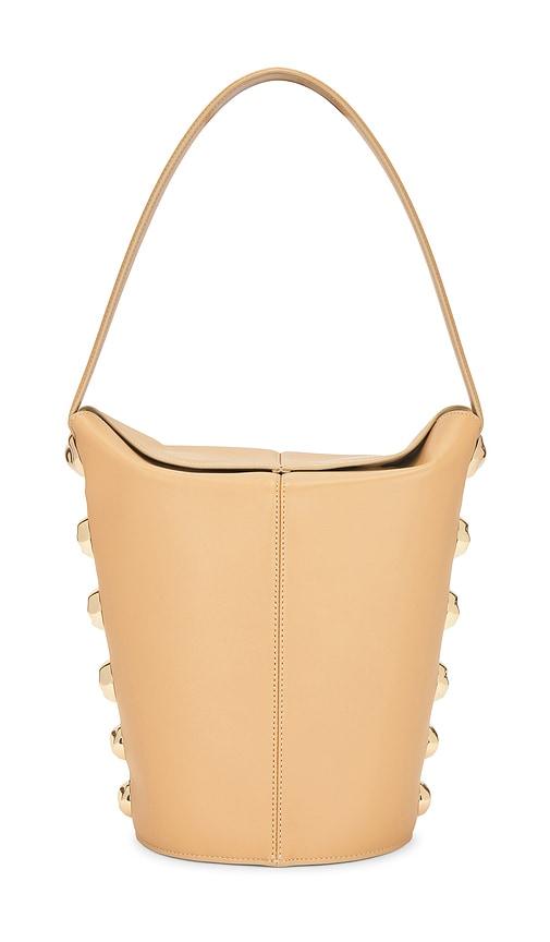 simkhai amaya bucket bag in nude.