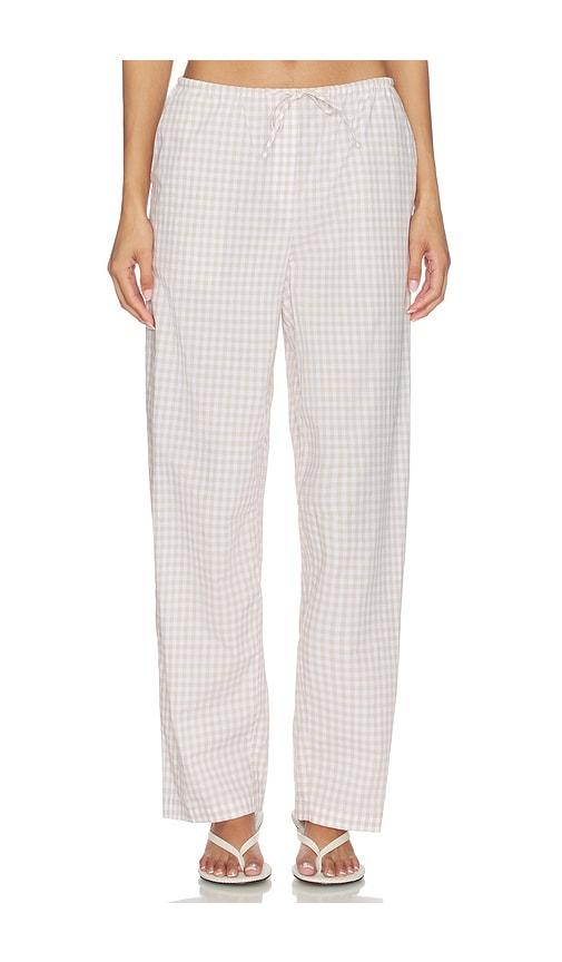 simkhai drawstring pant in beige.