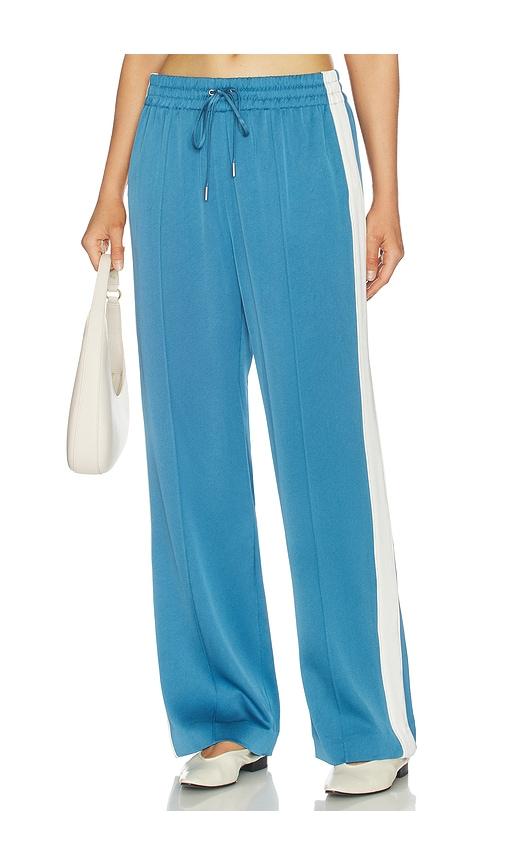 simkhai nolan satin side striped pant in blue.