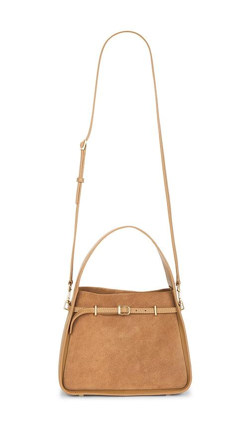 simkhai small cleo bucket bag in tan.