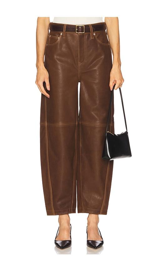 simkhai waldon curved leg pant in brown.
